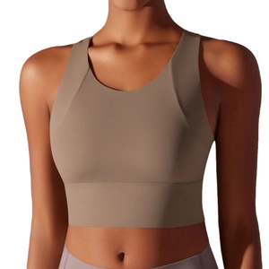 Brown padded sports bra with wide shoulder straps for fitness and yoga activities