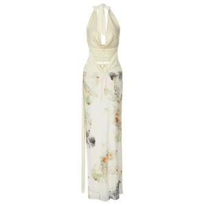Detail of floral print slit maxi skirt and halter top with drawstring and waist ties