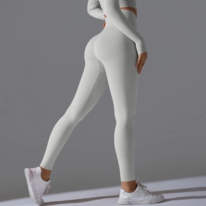 Detail shot of seamless high waist scrunch butt yoga leggings in light grey fabric