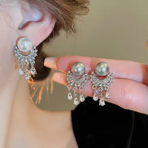Silver needle pearl fringe earrings with sparkling cubic zirconia and water-drop pendants