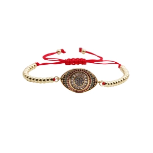 Handmade red cord Evil Eye bracelet with sparkling zircon inlay and gold beads