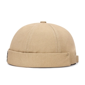 Cappello docker classico in cotone kaki con cuciture vintage e design senza tesa