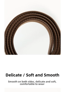 Close-up of brown leather belt showing smooth texture and neat edge stitching details