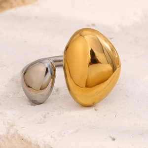 Close-up of two-tone open circle ring in 18K gold and silver polished stainless steel