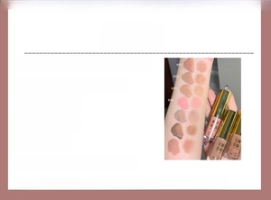 Swatches of matte liquid eyeshadow in earth tones and rosy shades on forearm