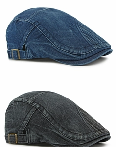 Détail de la casquette plate en jean vintage montrant la boucle et les coutures fines