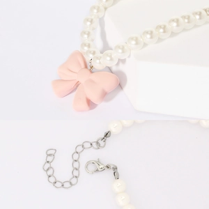 Pink bow pendant pearl dog collar necklace with adjustable metal clasp and chain