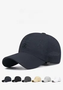 Close-up of breathable baseball cap with laser-cut holes and embossed R logo detail