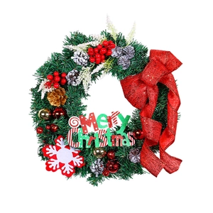Merry Christmas pine wreath with red bow, pine cones and festive ornaments on white background