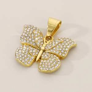 Detailed view of a gold-plated butterfly pendant with sparkling cubic zirconia pavé