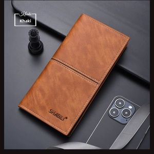 Detail view of khaki leather wallet with white stitching and brand logo on dark base