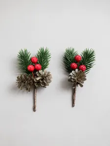 Detailed view of Christmas decorative sprigs with red berries, pine needles and pinecones