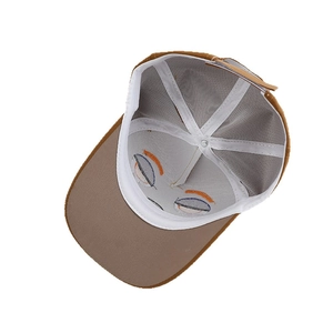 Inside view of brown kids baseball cap featuring embroidery backing and sweatband