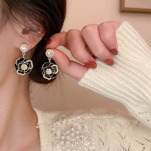 Elegant vintage camellia flower earrings with black petals, pearls and crystals