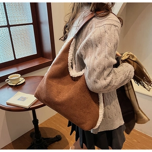 Brown suede shoulder bag with white faux fur trim and large capacity retro style design