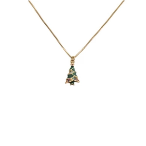 Gold-plated Christmas tree necklace with green enamel and multi-color crystals on white base