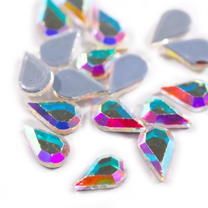 Macro view of teardrop K9 crystal AB rhinestones with multifaceted aurora borealis cuts