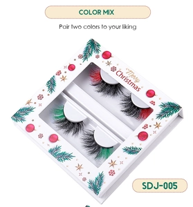 Detail of Christmas mixed color false eyelashes in festive white gift box packaging