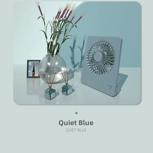 Close-up of a quiet blue square desk fan with minimalist design and multi-blade front