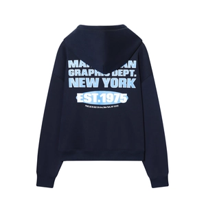 Detail view of the back of a navy hoodie showing vintage New York graphic print