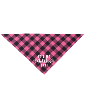 Detailed texture of pink buffalo plaid pet bandana with white It's My Gotcha Day lettering