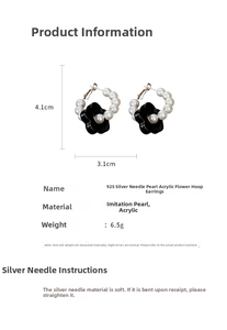 Detailed view of pearl flower hoop earrings with dimensions 4.1cm by 3.1cm on white background