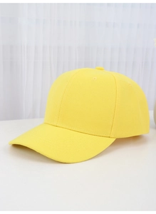 Close-up of yellow cotton baseball cap showing high-quality fabric texture and stitching