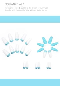 Detail of light blue press-on nails and white glitter gradient in coffin shape