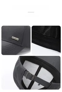 Detailed close-up of dark grey baseball cap showing metal buckle and fabric texture