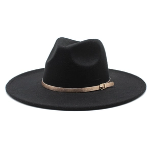 Close-up of black wool fedora hat featuring a metallic gold band and buckle detail