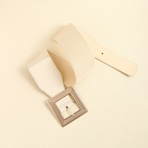 Women's beige elastic waist belt with a stylish gold square buckle and faux leather detail
