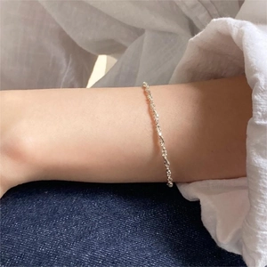 Minimalist S925 sterling silver beaded rope chain bracelet worn on a female wrist