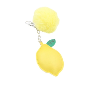 Lemon shaped PU leather keychain with green leaves and yellow fluffy fur ball accent