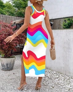 Detail of colorful wave pattern and side slit on a slim fit summer maxi dress