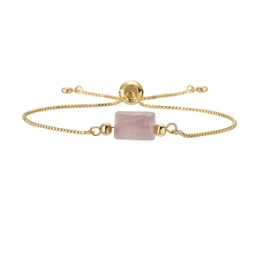 Detail of adjustable gold box chain bracelet featuring a pink rectangular natural stone
