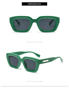 Detail view of stylish green rectangular sunglasses with silver metal temple accents