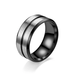 Detailed view of 8mm men's wedding band with silver brushed metal and black polished edges