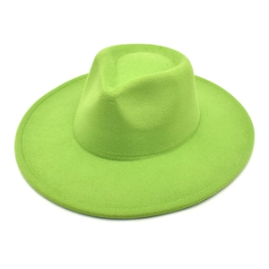 Detail of lime green wool fedora hat with teardrop crown and flat brim design