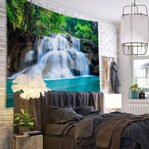 Detailed texture of forest waterfall tapestry on a white brick wall in a cozy bedroom