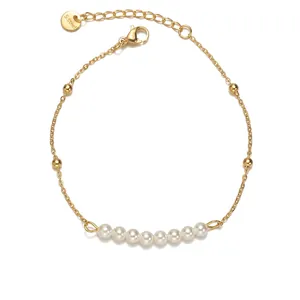14k gold plated stainless steel bracelet with white pearls and beads, 18+3cm length