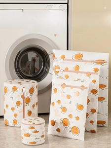 Detail of durable fine mesh laundry bag with orange citrus pattern for delicates