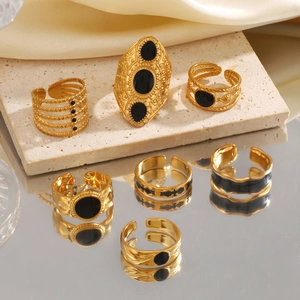 Vintage 18K gold plated stainless steel ring set with black enamel drip details