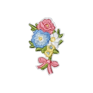 Embroidered floral patch with pink roses and blue flowers tied with a ribbon bow