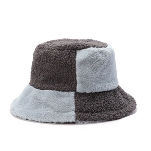 Macro detail of high-quality plush checkered bucket hat with thick faux fur texture