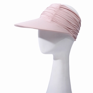 Close-up of pink sun visor with elastic pleated headband and wide cooling brim