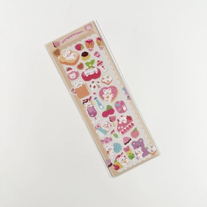 Detail of laser seal stickers featuring cute pink cartoon bears, desserts and fruits