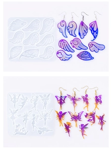 Detail view of angel wing and fairy silicone molds with glitter resin earrings