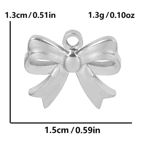 Detail of silver bow pendant showing dimensions of 1.5cm by 1.3cm and 1.3g weight