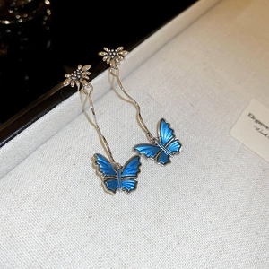 Boucles d'oreilles vintage élégantes papillon et marguerite avec émail bleu et argent