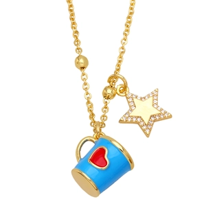 Gold chain necklace with a blue heart mug pendant and a sparkling star charm